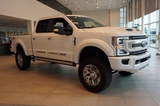 White Lifted Truck